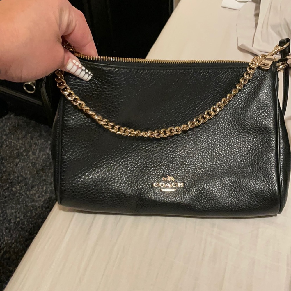 Super cute coach shoulder bag with chain.